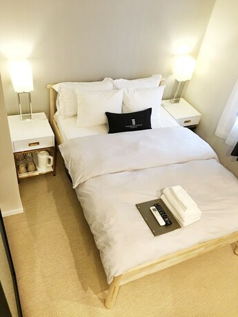 Imagen de la habitación del Hotel The Hideout Tokyo. Foto 31