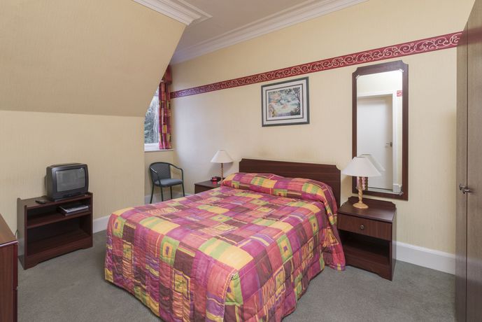 Imagen de la habitación del Hotel The Highland. Foto 13