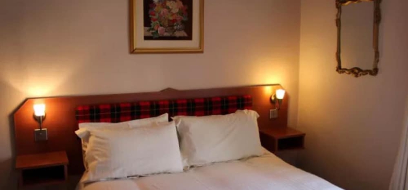 Imagen de la habitación del Hotel The Highland Guest House. Foto 4