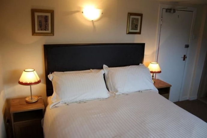 Imagen de la habitación del Hotel The Highland Guest House. Foto 5