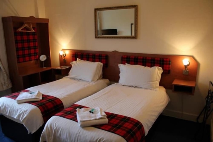 Imagen de la habitación del Hotel The Highland Guest House. Foto 8