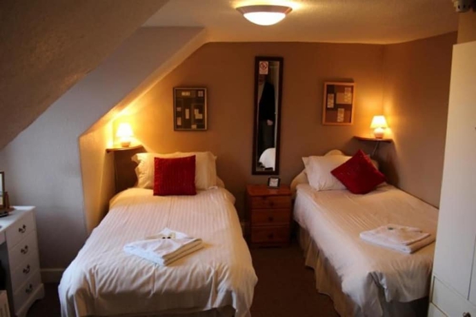 Imagen de la habitación del Hotel The Highland Guest House. Foto 9