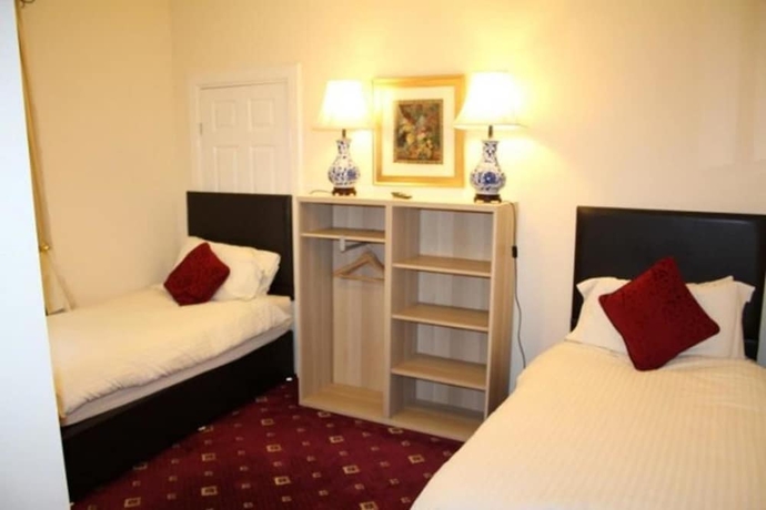 Imagen de la habitación del Hotel The Highland Guest House. Foto 10