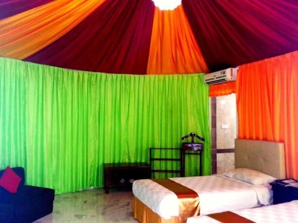 Imagen de la habitación del Hotel The Highland Park Resort Bogor. Foto 13