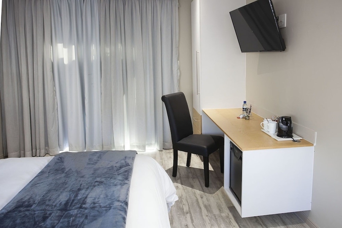 Imagen de la habitación del Hotel The Hill Boutique Bed and Breakfast. Foto 4