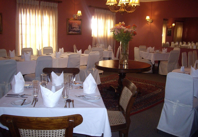 Imagen del bar/restaurante del Hotel The Hill Club. Foto 2
