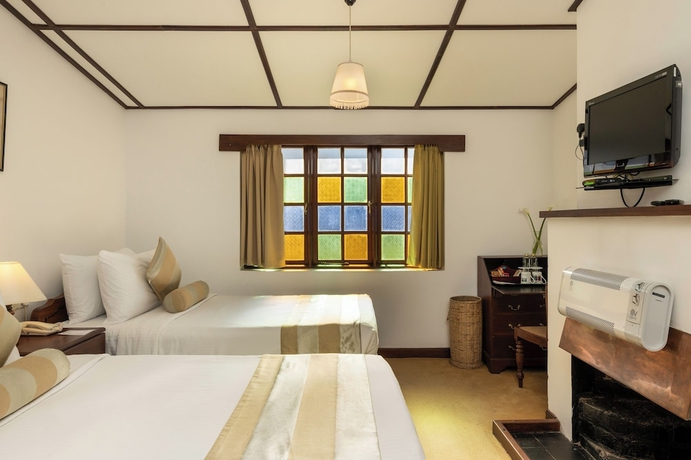 Imagen de la habitación del Hotel The Hill Club. Foto 4