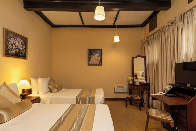 Imagen de la habitación del Hotel The Hill Club. Foto 6