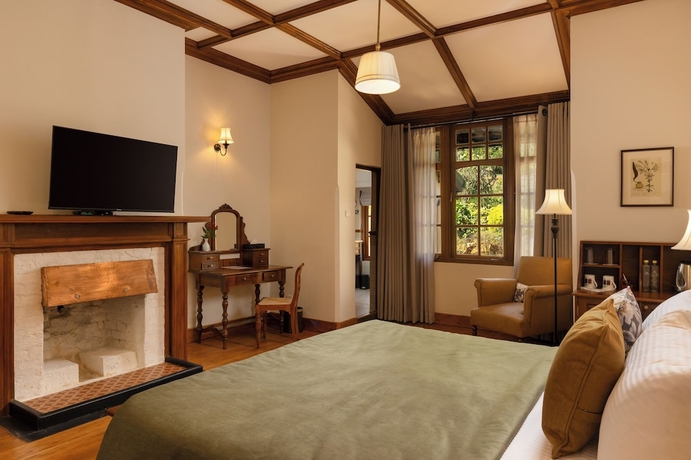 Imagen de la habitación del Hotel The Hill Club. Foto 9