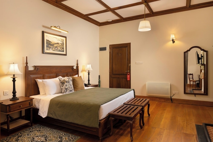 Imagen de la habitación del Hotel The Hill Club. Foto 10