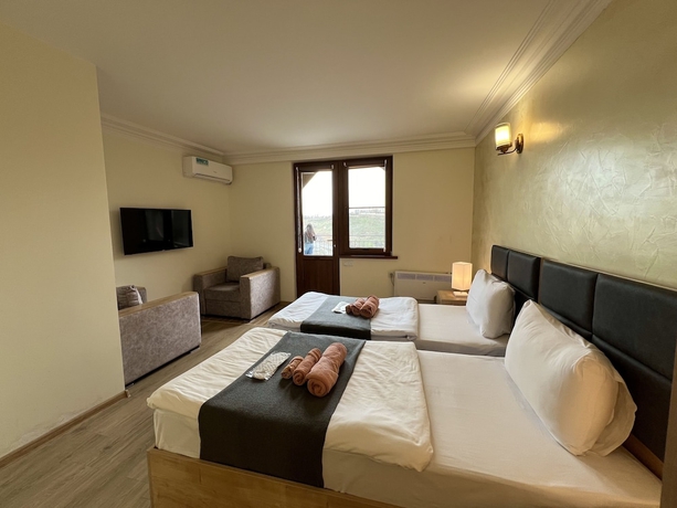 Imagen de la habitación del Hotel The Hill Guest House. Foto 15