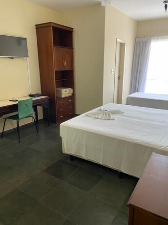 Imagen de la habitación del Hotel The Hill Hot&eacute;is Apart Suites. Foto 9