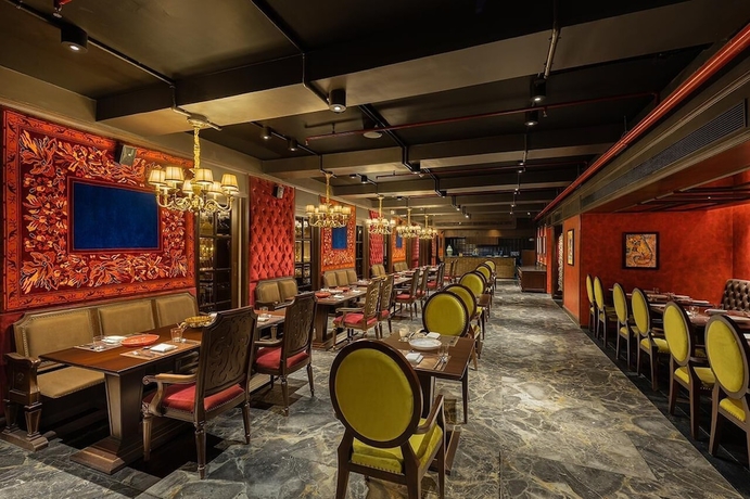 Imagen del bar/restaurante del Hotel The Hillock Ahmedabad. Foto 4