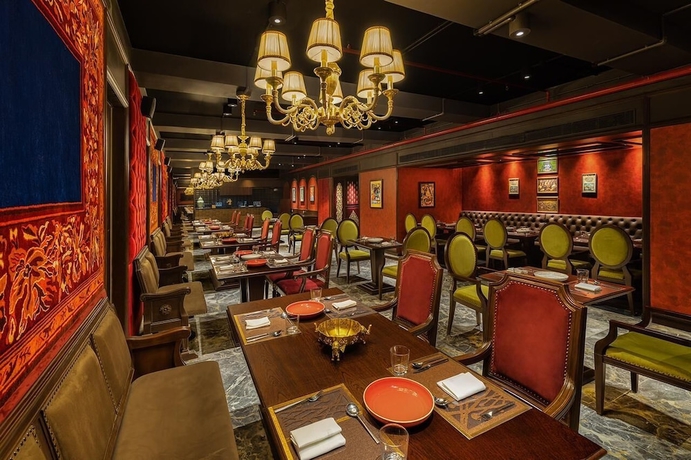 Imagen del bar/restaurante del Hotel The Hillock Ahmedabad. Foto 5