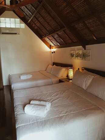 Imagen de la habitación del Hotel The Hillside Resort Siargao. Foto 16