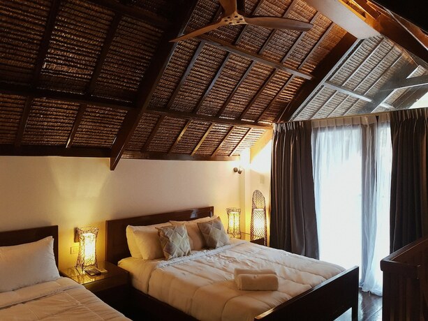 Imagen de la habitación del Hotel The Hillside Resort Siargao. Foto 19