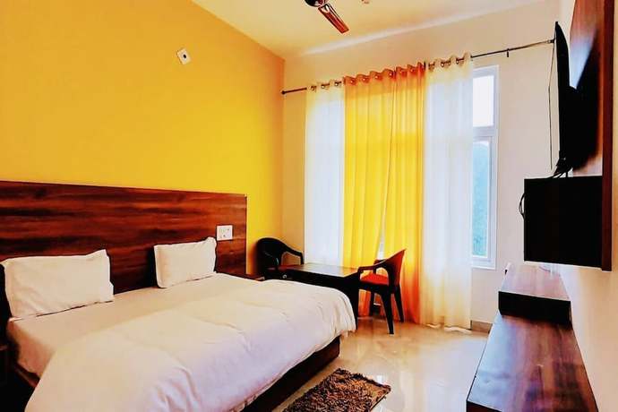 Imagen de la habitación del Hotel The Himalaya Orchid Guptkashi. Foto 8