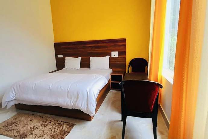 Imagen de la habitación del Hotel The Himalaya Orchid Guptkashi. Foto 9