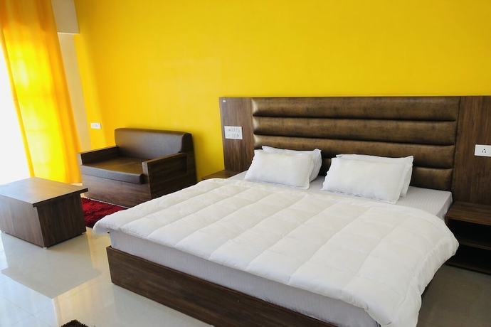 Imagen de la habitación del Hotel The Himalaya Orchid Guptkashi. Foto 11