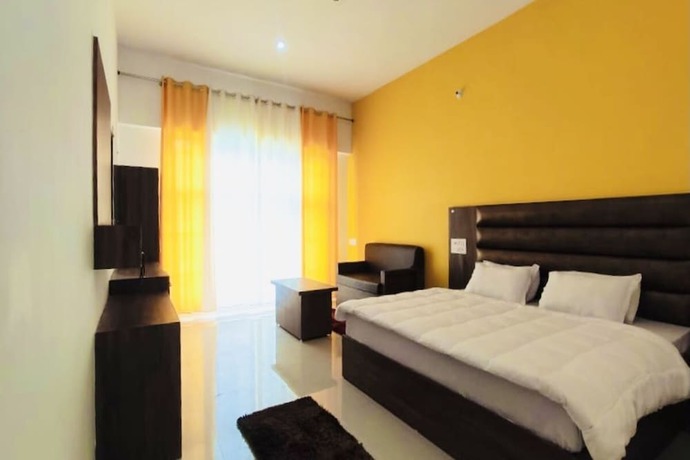 Imagen de la habitación del Hotel The Himalaya Orchid Guptkashi. Foto 15