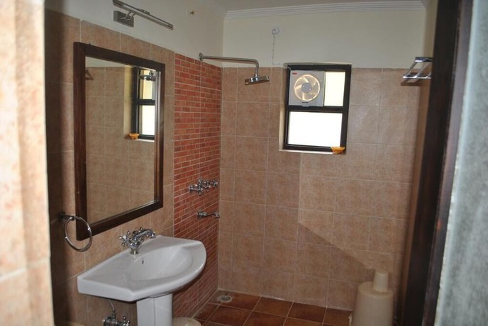 Imagen de la habitación del Hotel The Himalayan Lodge. Foto 6