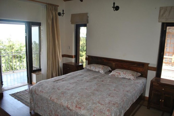 Imagen de la habitación del Hotel The Himalayan Lodge. Foto 8