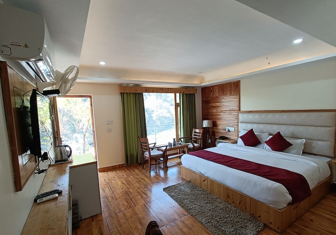 Imagen de la habitación del Hotel The Himalayan Odyssey and Cottages. Foto 3