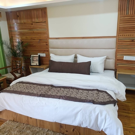 Imagen de la habitación del Hotel The Himalayan Odyssey and Cottages. Foto 5