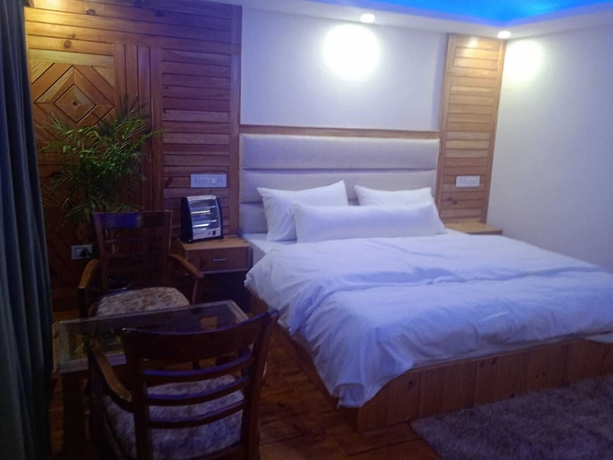 Imagen de la habitación del Hotel The Himalayan Odyssey and Cottages. Foto 7