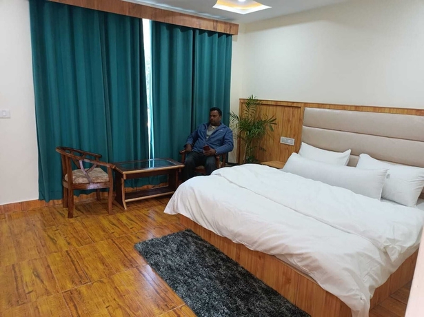 Imagen de la habitación del Hotel The Himalayan Odyssey and Cottages. Foto 8