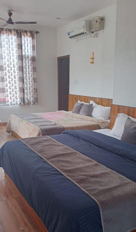 Imagen de la habitación del Hotel The Himalayan Odyssey and Cottages. Foto 10