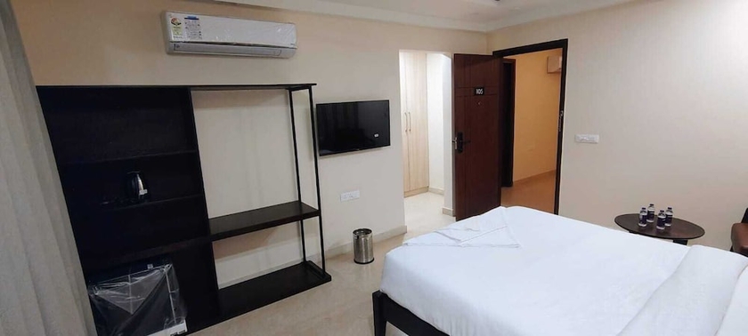 Imagen de la habitación del Hotel The Hi-rise. Foto 10