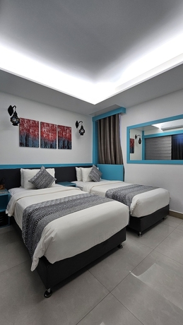 Imagen de la habitación del Hotel The Hive Beach. Foto 6