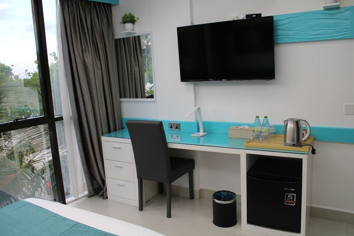 Imagen de la habitación del Hotel The Hive Beach. Foto 7