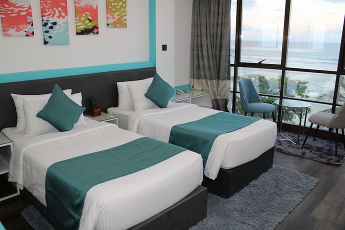 Imagen de la habitación del Hotel The Hive Beach. Foto 13