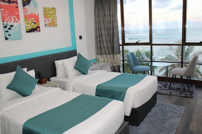 Imagen de la habitación del Hotel The Hive Beach. Foto 14