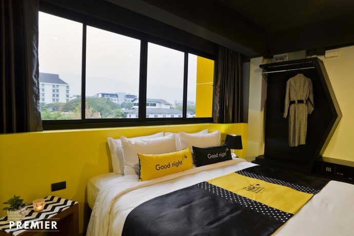 Imagen de la habitación del Hotel The Hive Chiang Mai. Foto 6
