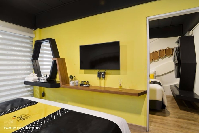 Imagen de la habitación del Hotel The Hive Chiang Mai. Foto 9