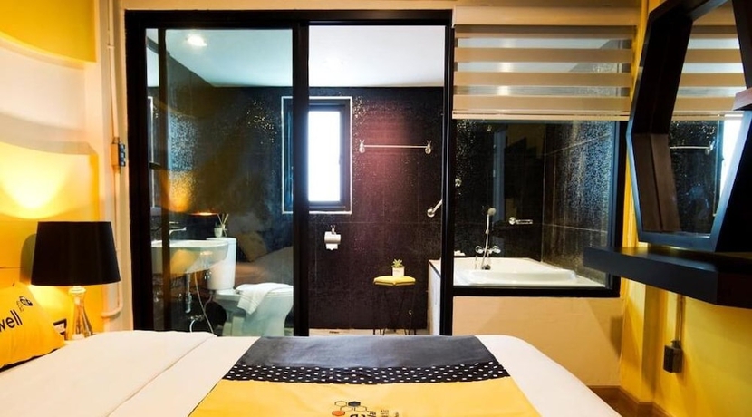 Imagen de la habitación del Hotel The Hive Chiang Mai. Foto 17