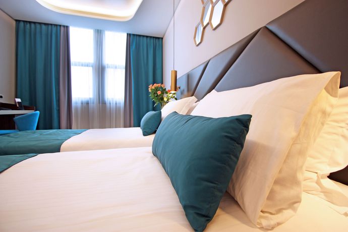 Imagen de la habitación del Hotel The Hive. Foto 17