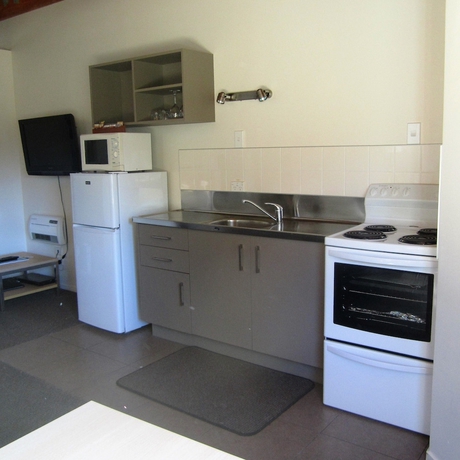 Imagen de la habitación del Hotel The Hobbit Motorlodge. Foto 16