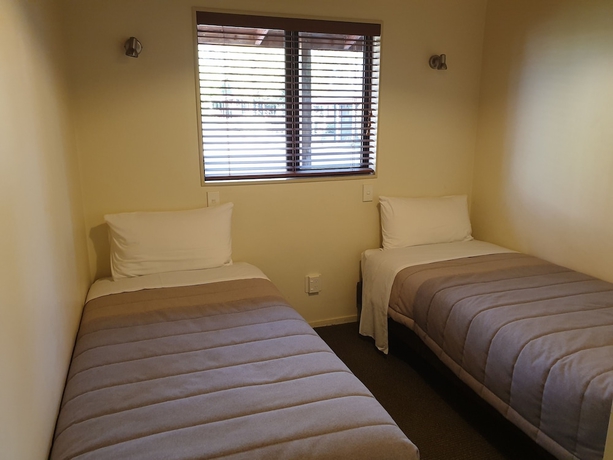 Imagen de la habitación del Hotel The Hobbit Motorlodge. Foto 17