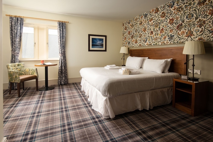 Imagen de la habitación del Hotel The Hog's Head Inn - The Inn Collection Group. Foto 11