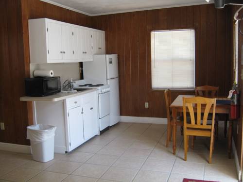 Imagen de la habitación del Hotel The Holiday Court Villas And Suites. Foto 6