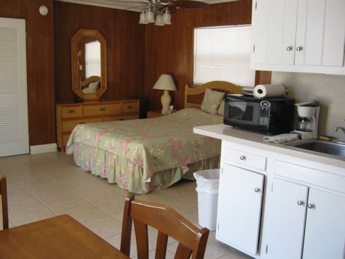 Imagen de la habitación del Hotel The Holiday Court Villas And Suites. Foto 7