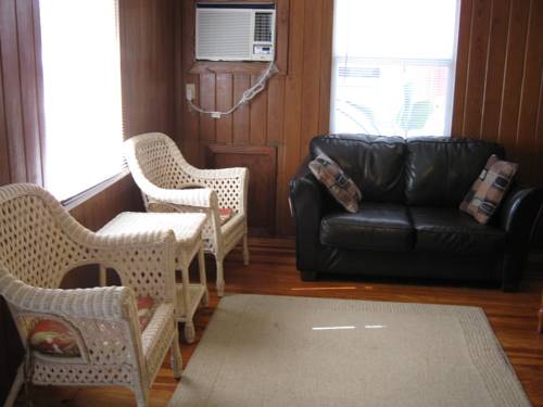 Imagen de la habitación del Hotel The Holiday Court Villas And Suites. Foto 11