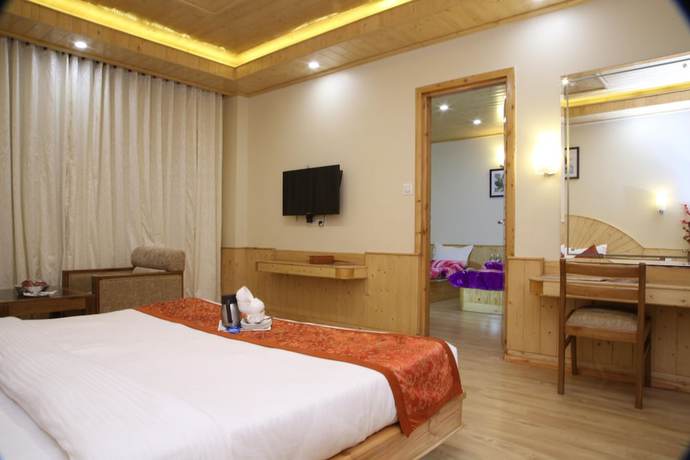Imagen de la habitación del Hotel The Holiday Heights Manali. Foto 6