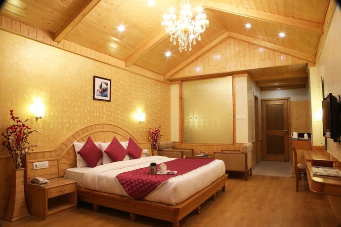 Imagen de la habitación del Hotel The Holiday Heights Manali. Foto 7