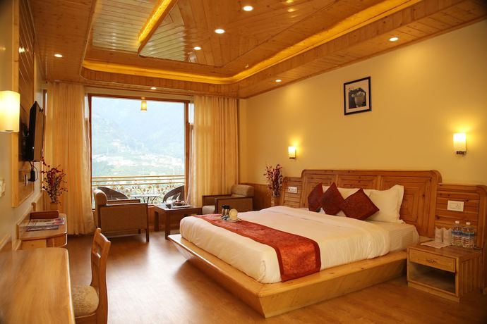 Imagen de la habitación del Hotel The Holiday Heights Manali. Foto 8
