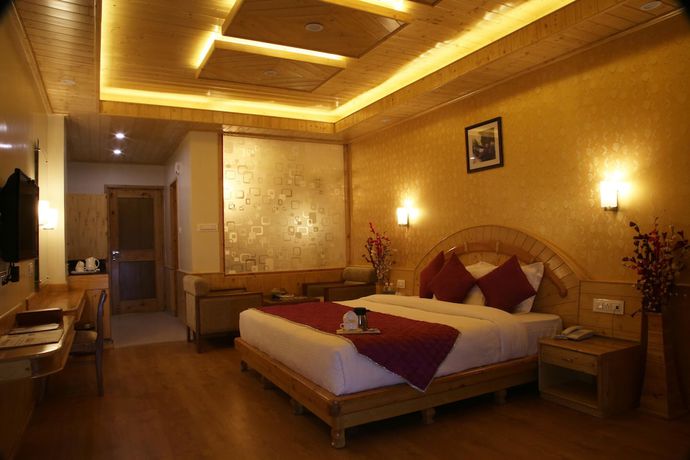 Imagen de la habitación del Hotel The Holiday Heights Manali. Foto 9